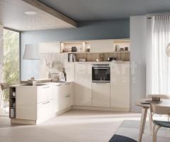 Cuisine en L couleur crème en style contemporain avec four encastrable et coin repas